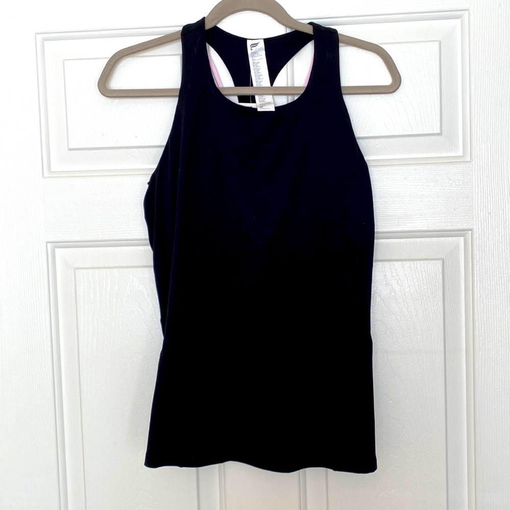 Fabletics fitted tank top with built in bra. Purple strappy back detail.